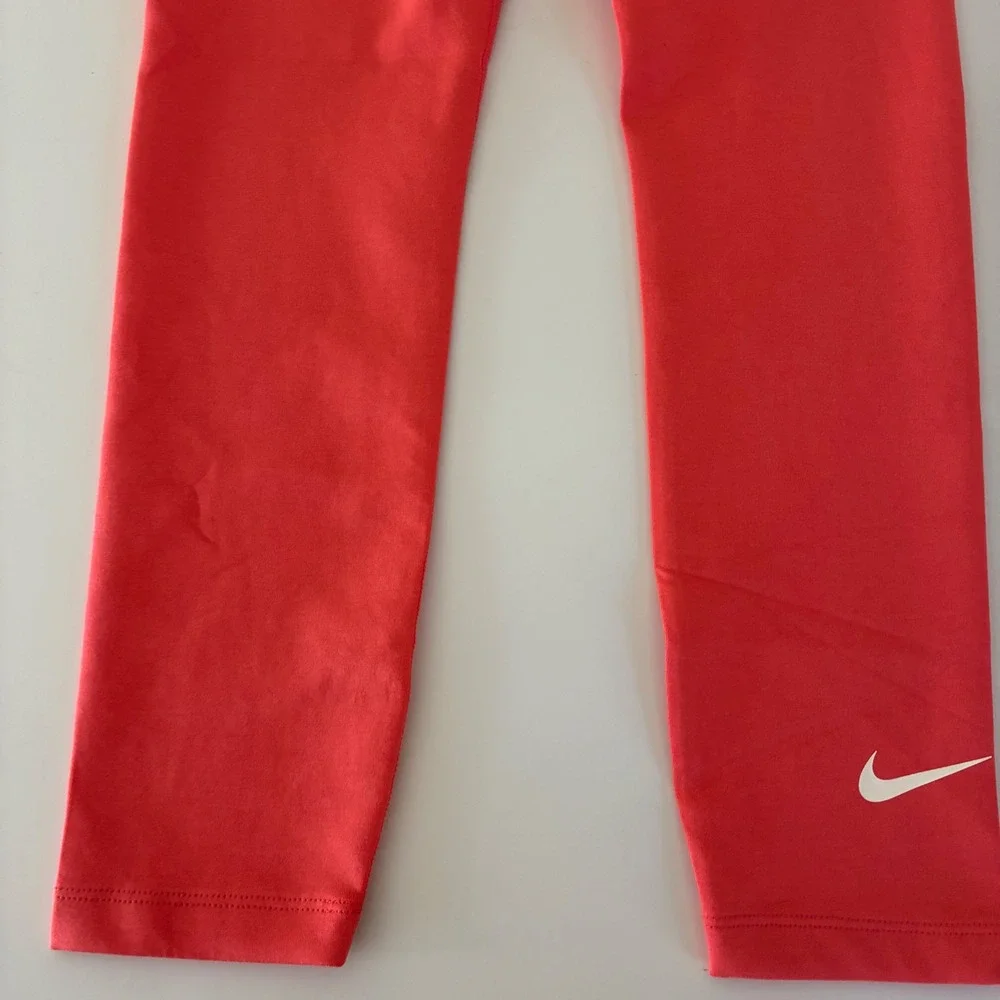 Nike Womens Size Small Sportswear Leggings Coral Pink 7/8 Active Tights NWT‎
